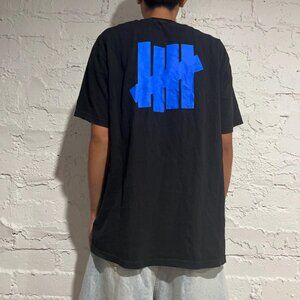 Rare Vintage crazy Undefeated Black and Blue Logo on the back and front Streetwe